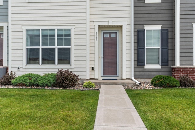 8312 Jonquil Ln N, Maple Grove, MN 55369 - property entrance featuring a lawn