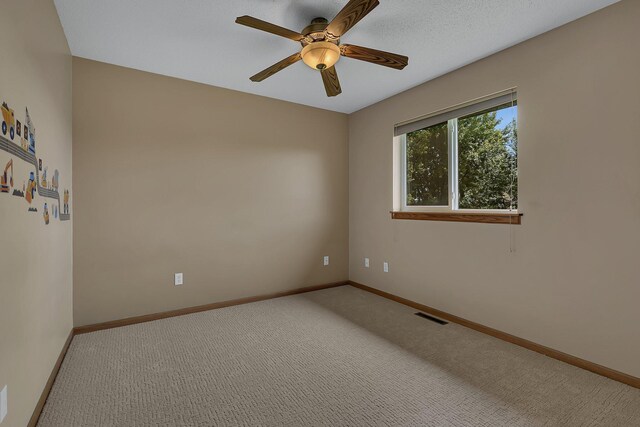 1294 Stone Ridge Rd, Sauk Rapids, MN 56379 - unfurnished room with a ceiling fan and carpet flooring