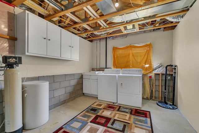1294 Stone Ridge Rd, Sauk Rapids, MN 56379 - laundry area with cabinet space, washer and clothes dryer, and concrete block wall