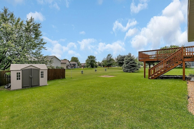 1294 Stone Ridge Rd, Sauk Rapids, MN 56379 - view of yard with a storage shed, stairway, and a deck