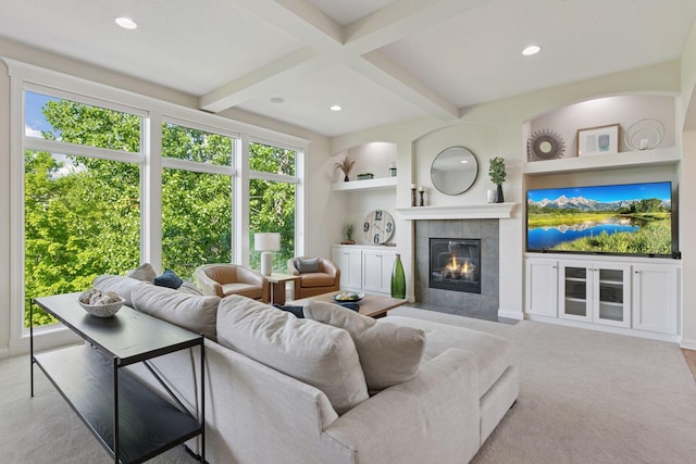 17607 64th Pl N, Maple Grove, MN 55311 - carpeted living area with a tiled fireplace, beam ceiling, recessed lighting, and built in shelves