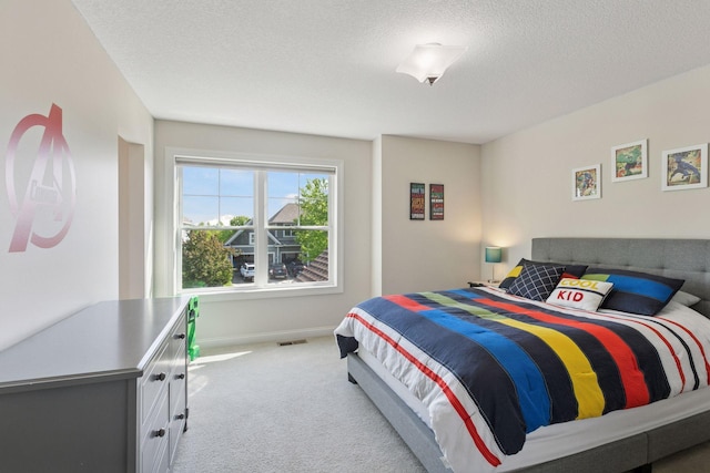 17607 64th Pl N, Maple Grove, MN 55311 - carpeted bedroom with a textured ceiling and baseboards