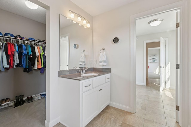 17607 64th Pl N, Maple Grove, MN 55311 - full bath featuring vanity, a spacious closet, and tile patterned flooring