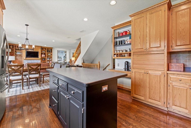 1111 Woods Creek Dr, Delano, MN 55328 - kitchen featuring a kitchen island, dark wood finished floors, open floor plan, recessed lighting, and stainless steel fridge with ice dispenser