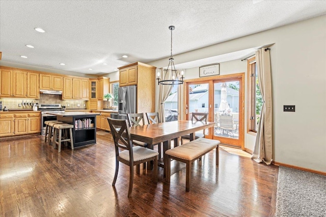 1111 Woods Creek Dr, Delano, MN 55328 - dining space with dark wood-style flooring, a textured ceiling, recessed lighting, and a chandelier