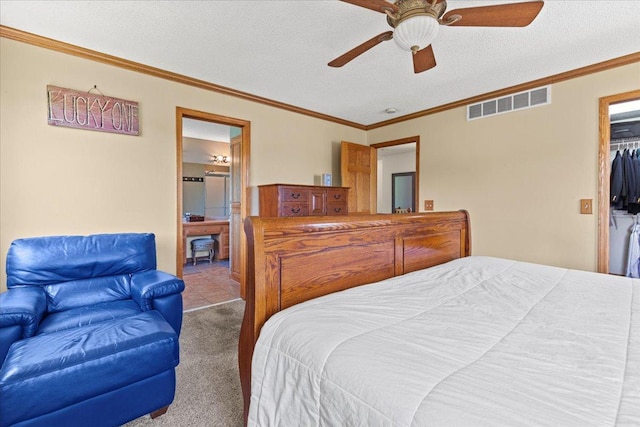 1111 Woods Creek Dr, Delano, MN 55328 - carpeted bedroom featuring ornamental molding, ceiling fan, and a textured ceiling