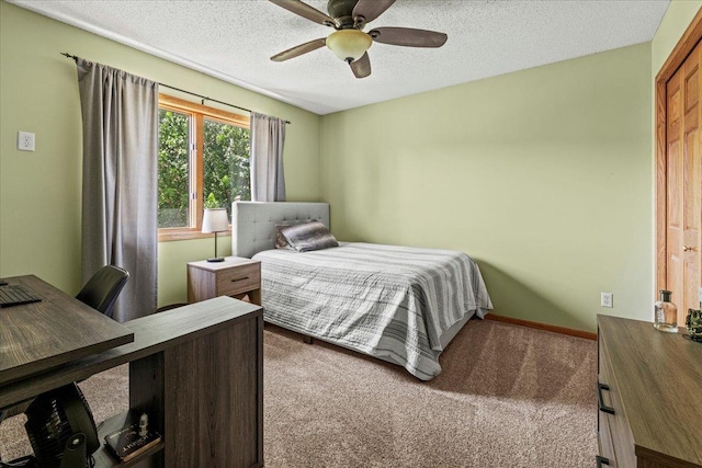 1111 Woods Creek Dr, Delano, MN 55328 - carpeted bedroom featuring a textured ceiling and a ceiling fan