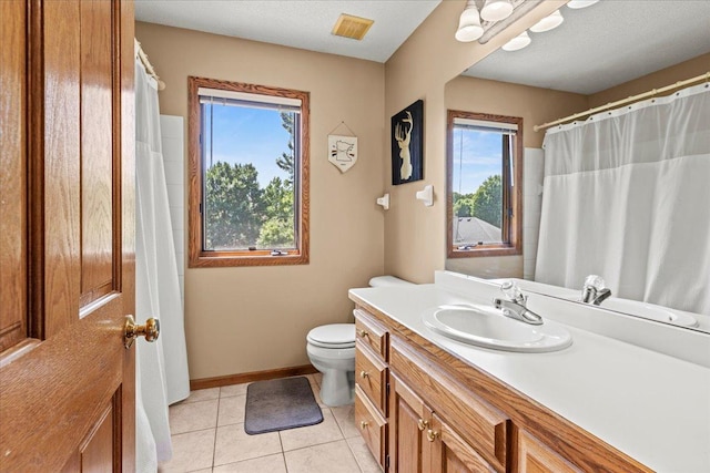 1111 Woods Creek Dr, Delano, MN 55328 - full bathroom with vanity, plenty of natural light, and tile patterned flooring