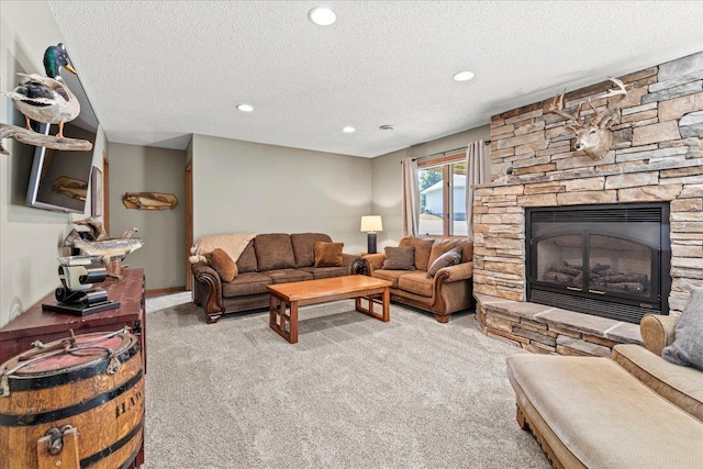 1111 Woods Creek Dr, Delano, MN 55328 - living area with light carpet, a stone fireplace, recessed lighting, and a textured ceiling