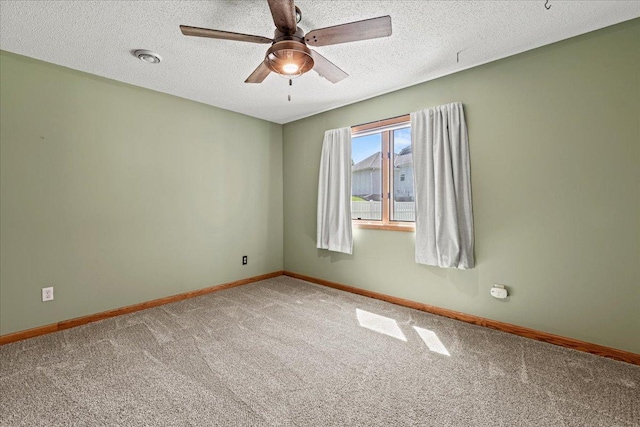 1111 Woods Creek Dr, Delano, MN 55328 - unfurnished room with carpet floors, a ceiling fan, and a textured ceiling