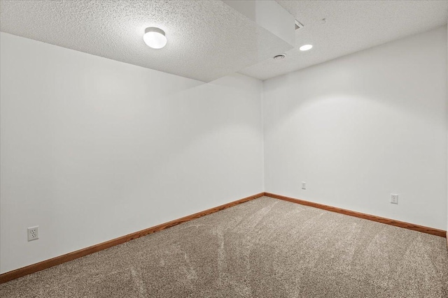 1111 Woods Creek Dr, Delano, MN 55328 - empty room featuring carpet flooring, a textured ceiling, and recessed lighting