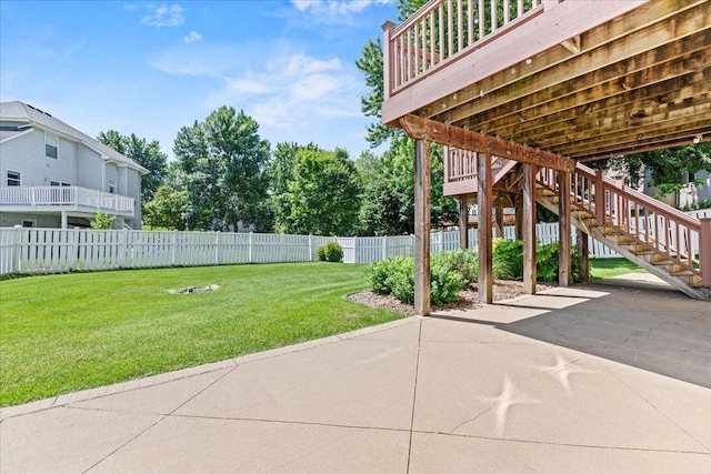 1111 Woods Creek Dr, Delano, MN 55328 - fenced backyard featuring a patio area, stairway, and a deck