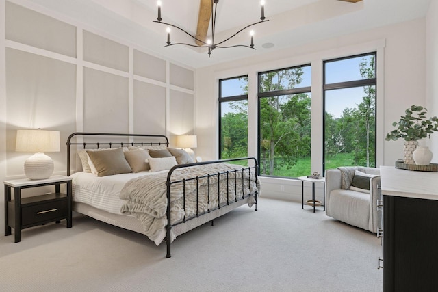 4864 148th Ave, Ham Lake, MN 55304 - bedroom with a chandelier and light carpet