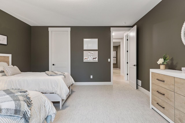 4864 148th Ave, Ham Lake, MN 55304 - bedroom featuring light carpet and baseboards