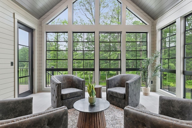 4864 148th Ave, Ham Lake, MN 55304 - sunroom / solarium featuring vaulted ceiling, tile patterned flooring, plenty of natural light, wood ceiling, and wooden walls