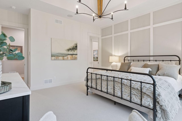 4864 148th Ave, Ham Lake, MN 55304 - carpeted bedroom with a chandelier and baseboards