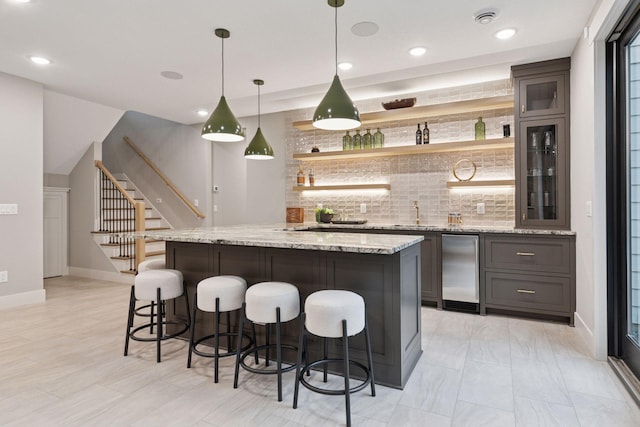 4864 148th Ave, Ham Lake, MN 55304 - indoor bar with backsplash, stairs, refrigerator, pendant lighting, and recessed lighting