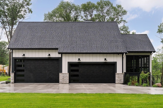 4864 148th Ave, Ham Lake, MN 55304 - modern inspired farmhouse with stone siding, board and batten siding, and concrete driveway