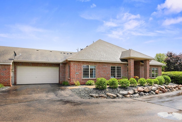 4438 Napier Pkwy NE, Saint Michael, MN 55376 - view of front of home with brick siding, driveway, roof with shingles, and a garage