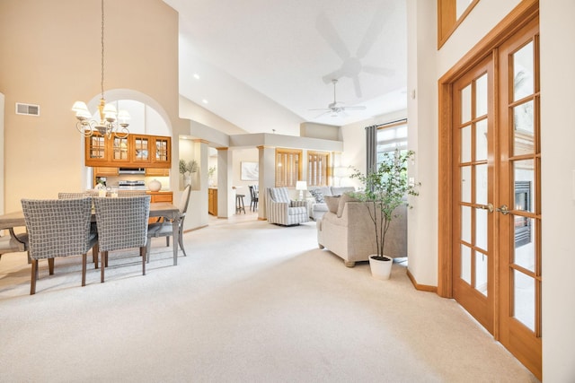 4438 Napier Pkwy NE, Saint Michael, MN 55376 - dining area featuring light carpet, a chandelier, high vaulted ceiling, and a ceiling fan