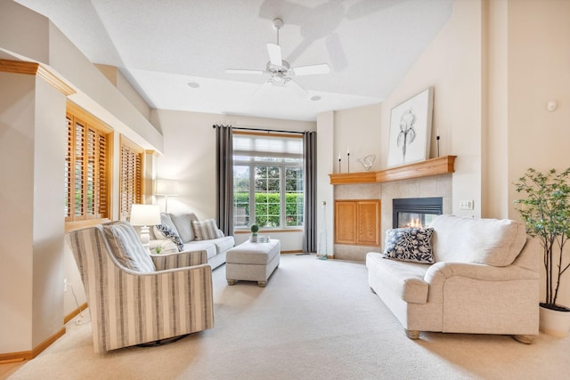 4438 Napier Pkwy NE, Saint Michael, MN 55376 - carpeted living room featuring ceiling fan, a tiled fireplace, and lofted ceiling