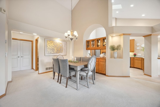 4438 Napier Pkwy NE, Saint Michael, MN 55376 - dining room featuring light colored carpet, a chandelier, recessed lighting, and high vaulted ceiling