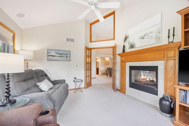4438 Napier Pkwy NE, Saint Michael, MN 55376 - living room featuring carpet, a ceiling fan, a premium fireplace, high vaulted ceiling, and french doors
