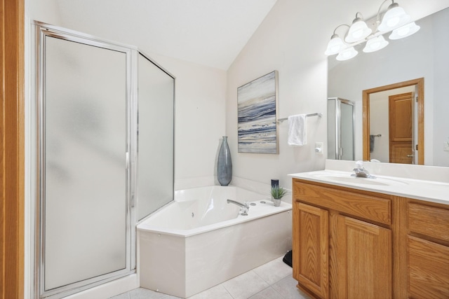 4438 Napier Pkwy NE, Saint Michael, MN 55376 - full bathroom with lofted ceiling, a stall shower, vanity, a garden tub, and tile patterned flooring