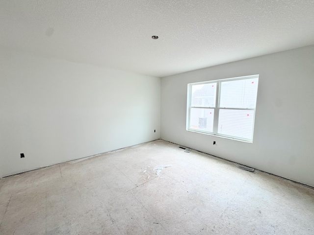 2333 Jandell Ave NE, Saint Michael, MN 55376 - spare room featuring a textured ceiling