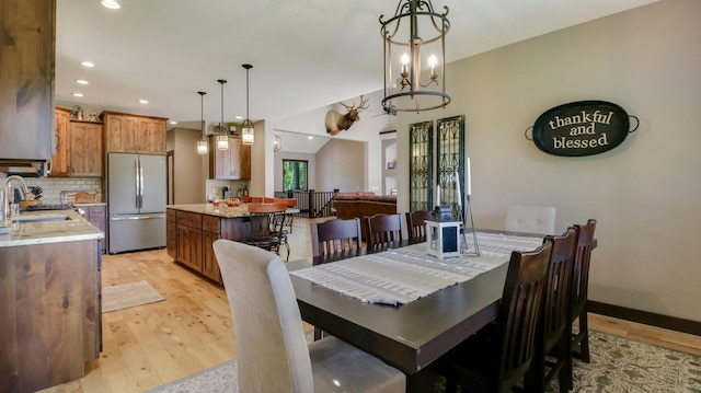 30488 292nd St, Lake Holcombe Twp, WI 54745 - dining area featuring light wood finished floors, a chandelier, and recessed lighting