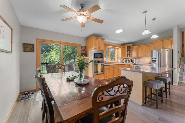 9009 44th Cir N, New Hope, MN 55428 - dining room with light wood finished floors and ceiling fan