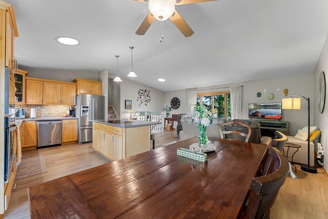 9009 44th Cir N, New Hope, MN 55428 - dining room with lofted ceiling, a ceiling fan, light wood finished floors, and recessed lighting