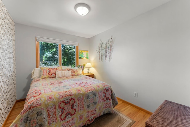 9009 44th Cir N, New Hope, MN 55428 - bedroom featuring light wood finished floors and baseboards