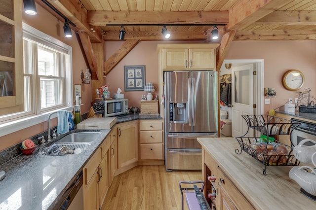 5393 Bachelor Rd NW, Hackensack, MN 56452 - kitchen with stainless steel appliances, a wood ceiling with exposed beams, rail lighting, light brown cabinets, and light wood-style flooring