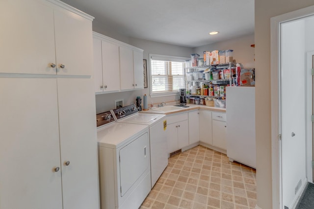 5393 Bachelor Rd NW, Hackensack, MN 56452 - washroom with cabinet space, independent washer and dryer, and recessed lighting