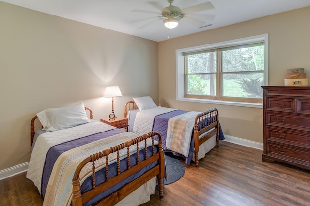 5393 Bachelor Rd NW, Hackensack, MN 56452 - bedroom featuring dark wood-type flooring and ceiling fan