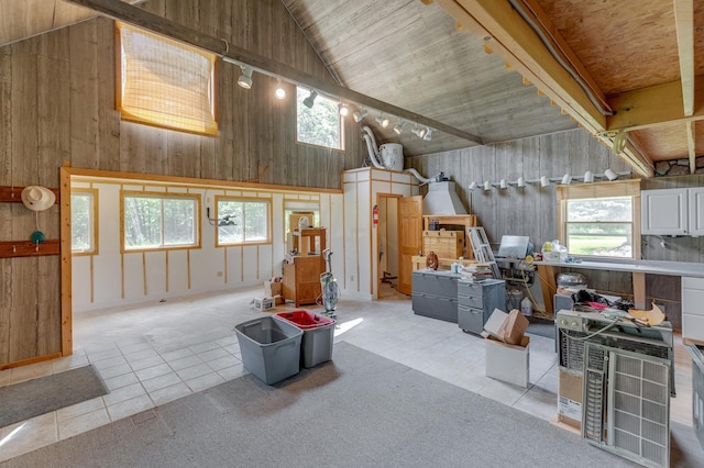 5393 Bachelor Rd NW, Hackensack, MN 56452 - interior space with high vaulted ceiling, tile patterned floors, and wooden walls
