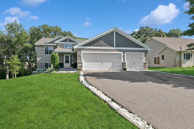 1465 19th St SE, Saint Cloud, MN 56304 - craftsman inspired home featuring stone siding, driveway, a garage, and a front lawn