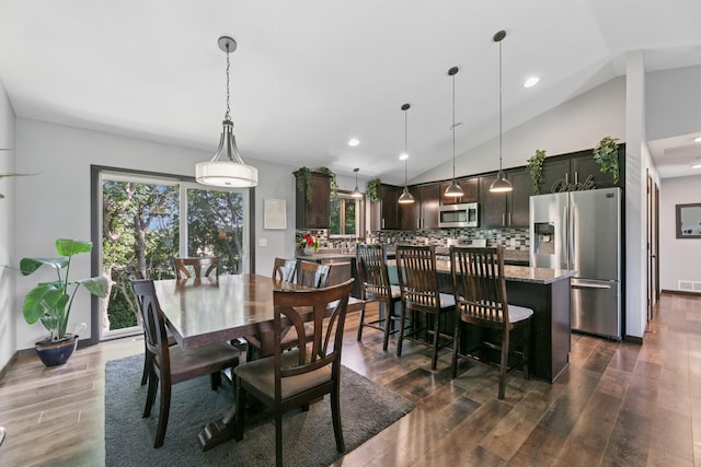 1465 19th St SE, Saint Cloud, MN 56304 - dining room with lofted ceiling, healthy amount of natural light, dark wood finished floors, and recessed lighting