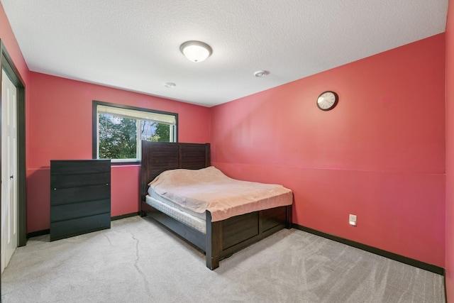 1465 19th St SE, Saint Cloud, MN 56304 - bedroom with carpet and a textured ceiling