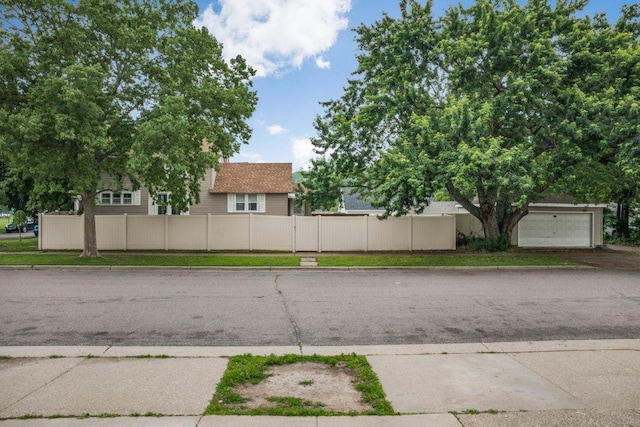402 Clifton St, Saint Paul, MN 55102 - view of asphalt road featuring curbs