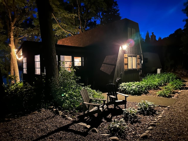 22281 670th Ave, Darwin Twp, MN 55324 - view of back of house at night