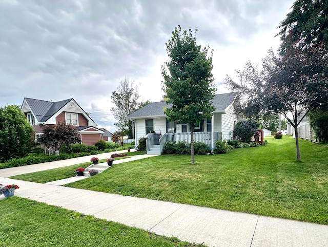 607 Washington Ave, Spring Valley, MN 55975 - view of front of property with a front yard and a porch