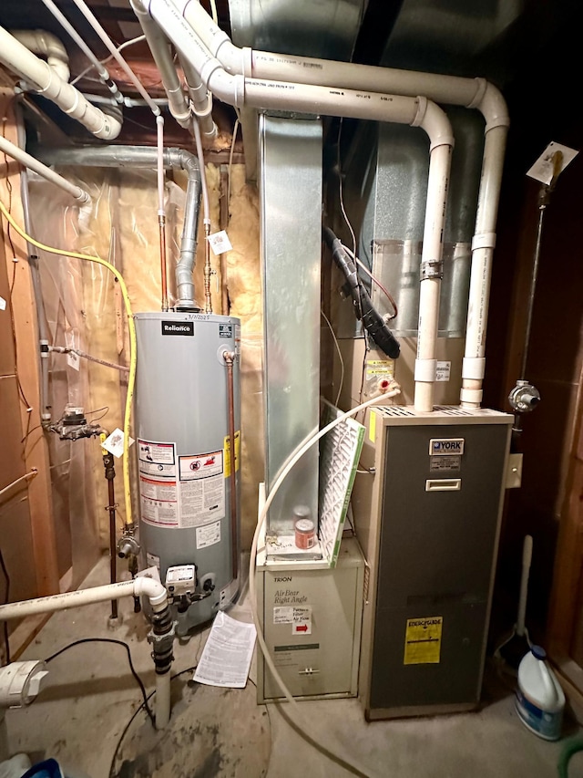 607 Washington Ave, Spring Valley, MN 55975 - utility room with water heater and heating unit