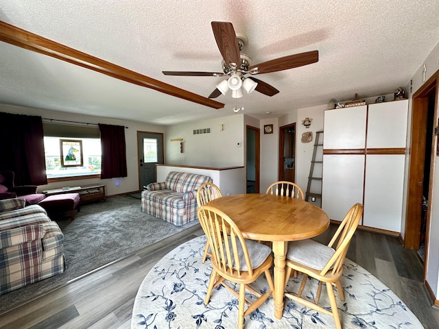 607 Washington Ave, Spring Valley, MN 55975 - dining space featuring a textured ceiling, ceiling fan, and light wood finished floors