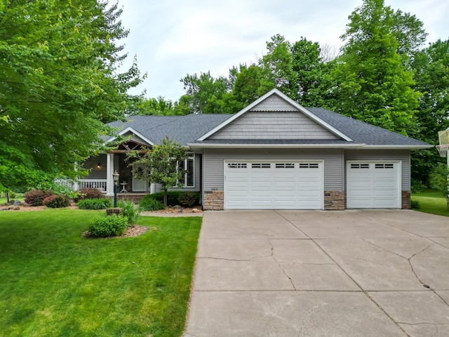 1403 Elm Ave W, Menomonie, WI 54751 - craftsman-style house featuring an attached garage, driveway, a front yard, roof with shingles, and a porch