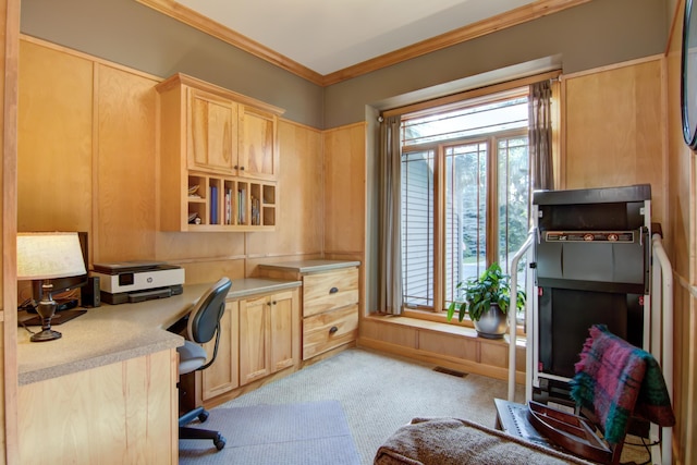 1403 Elm Ave W, Menomonie, WI 54751 - office area featuring built in desk, crown molding, and light colored carpet