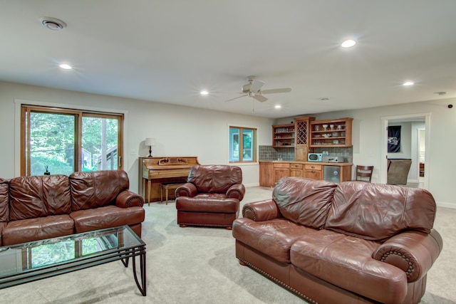 1403 Elm Ave W, Menomonie, WI 54751 - living area with light carpet, ceiling fan, recessed lighting, and bar area