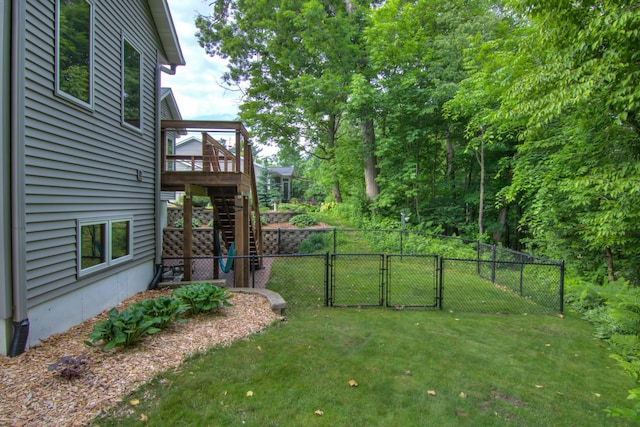 1403 Elm Ave W, Menomonie, WI 54751 - view of yard with a gate, stairs, and a wooden deck
