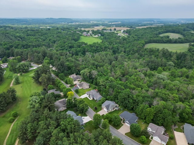 1403 Elm Ave W, Menomonie, WI 54751 - aerial overview of property's location featuring a forest and nearby suburban area